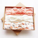 Three bows with bows with a gift box