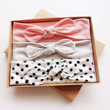 Three bows with bows with a gift box